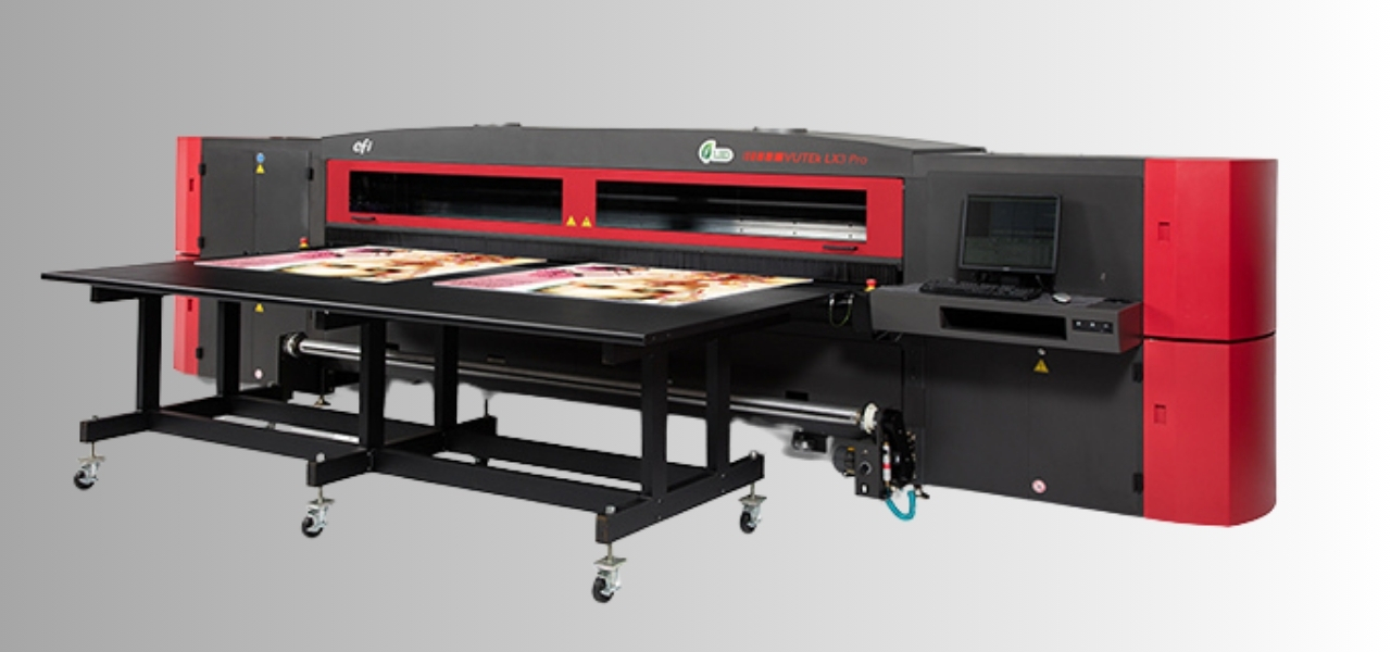 EFI Vutek LX3 printer in a production environment, showcasing advanced UV printing technology for vibrant graphics.