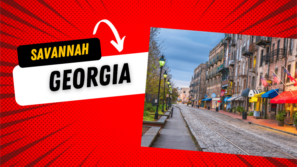 Charming historic district of downtown Savannah, GA with cobblestone streets and oak trees.