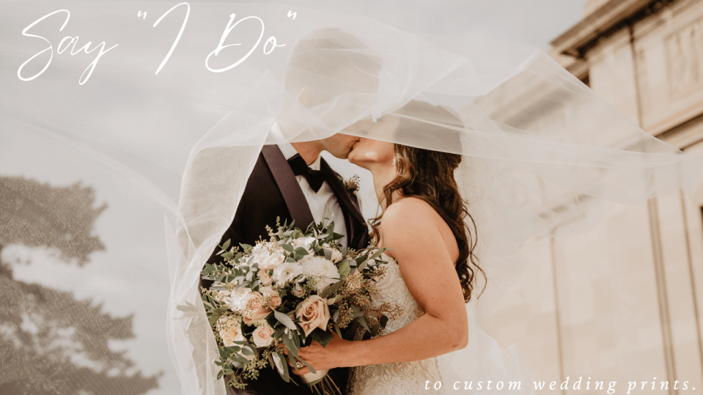 A romantic moment of a couple sharing a kiss at their wedding ceremony, surrounded by beautiful decor.
