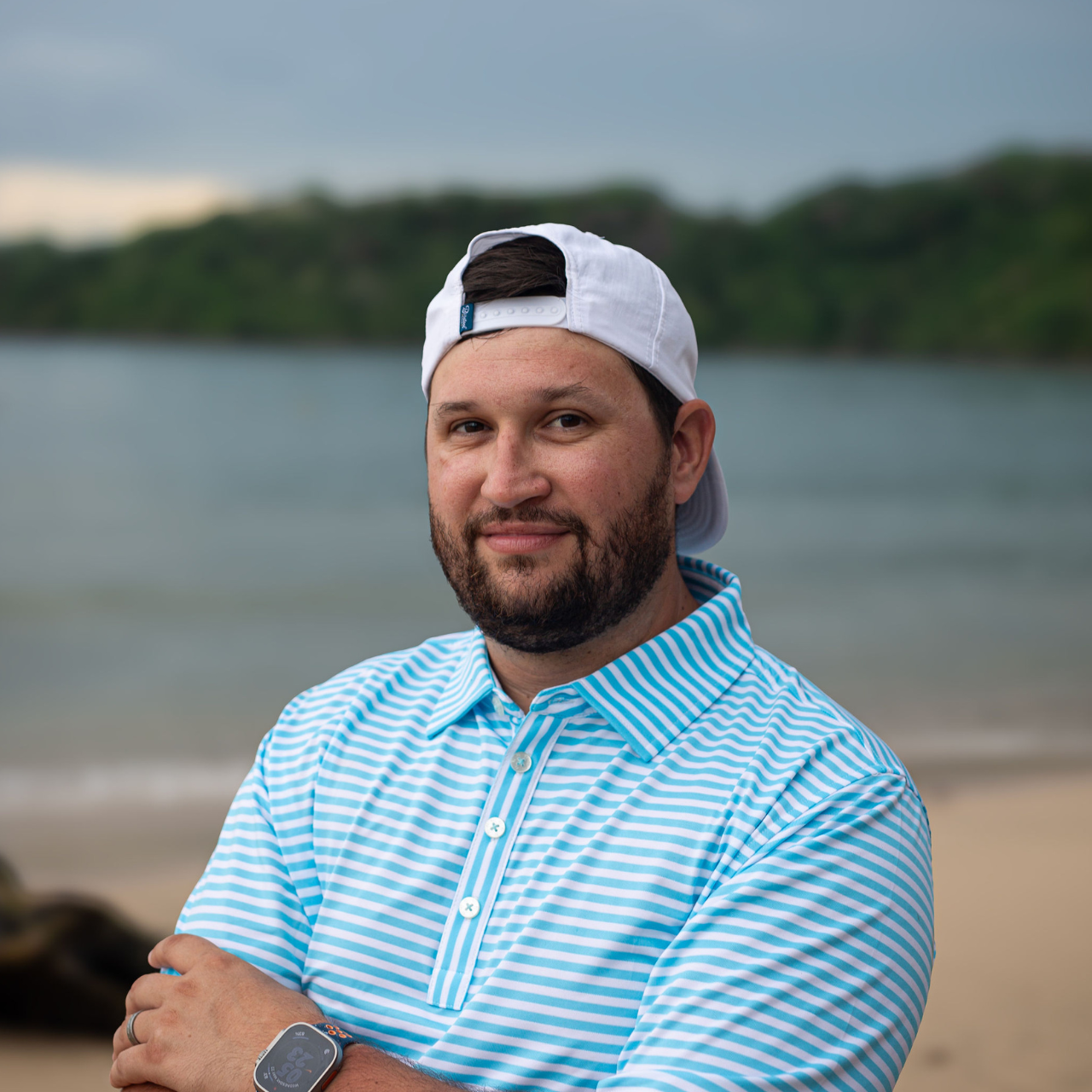 Logan Watson, production manager at VistaCraft, overseeing the printing process with a focused expression.