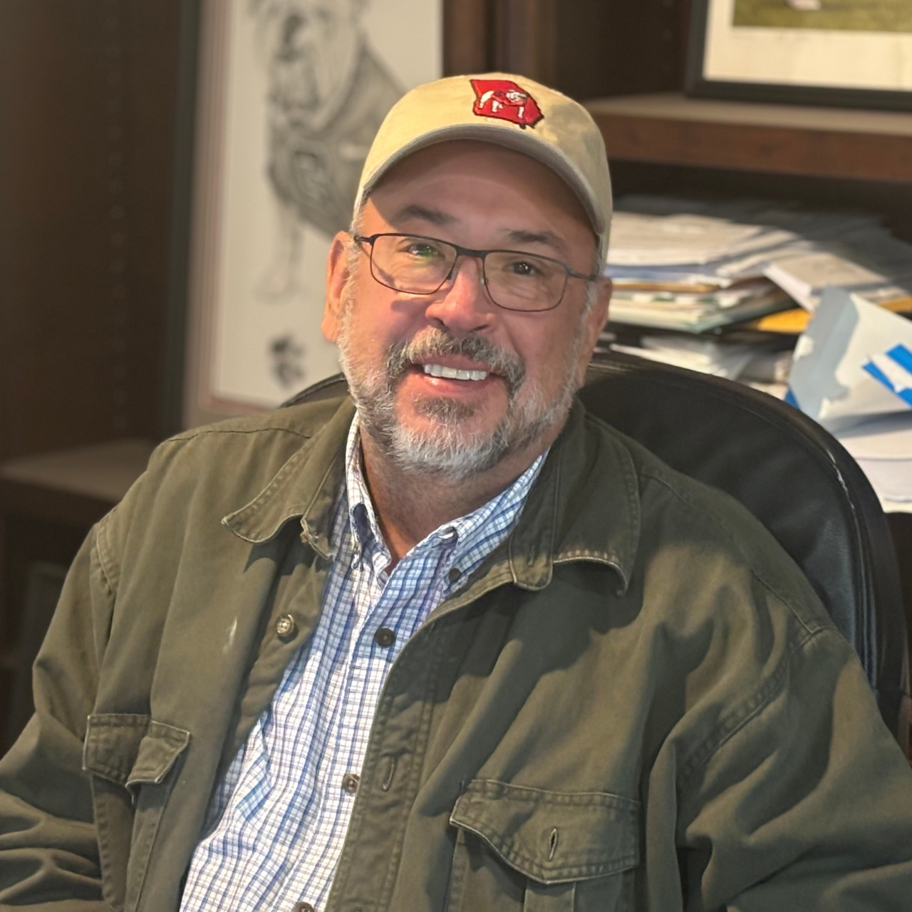 Mark Watson, president of VistaCraft, smiling confidently in the office setting.
