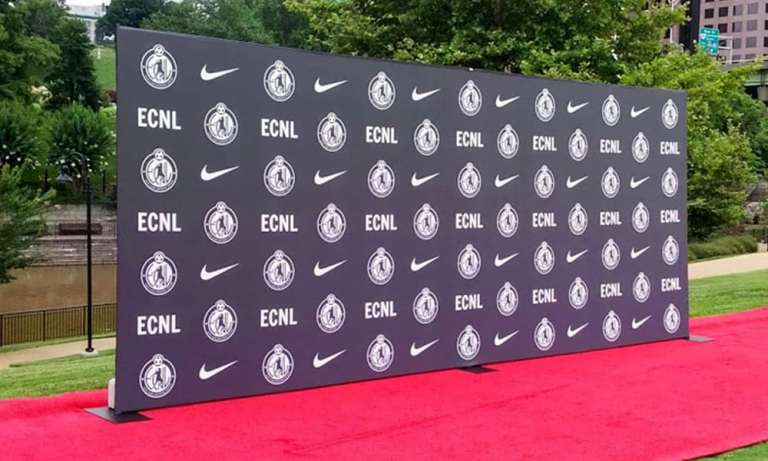 Colorful event backdrop with logo and branding for photo opportunities