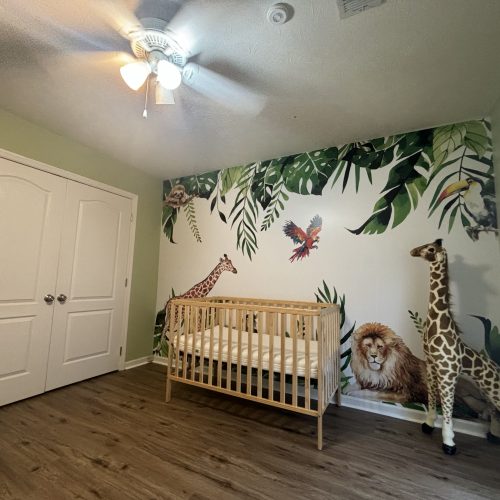 A stylish room featuring custom printed wallpaper with vibrant patterns and textures.